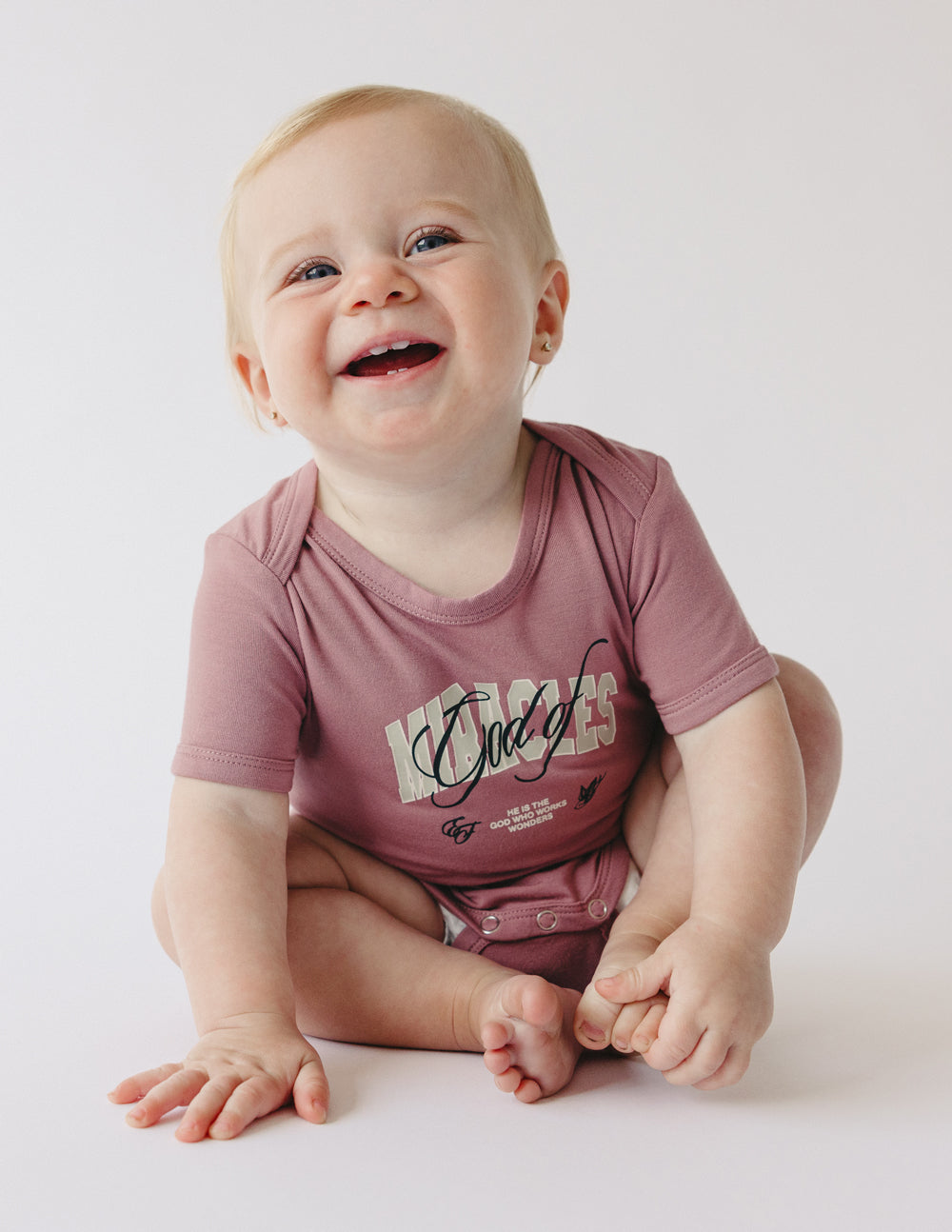 God of Miracles Onesie